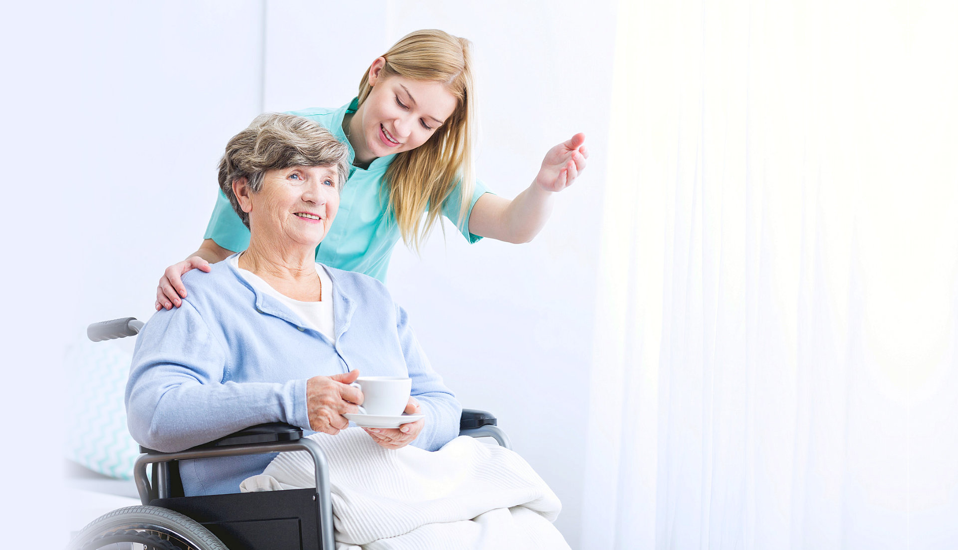 caregiver assisting senior woman