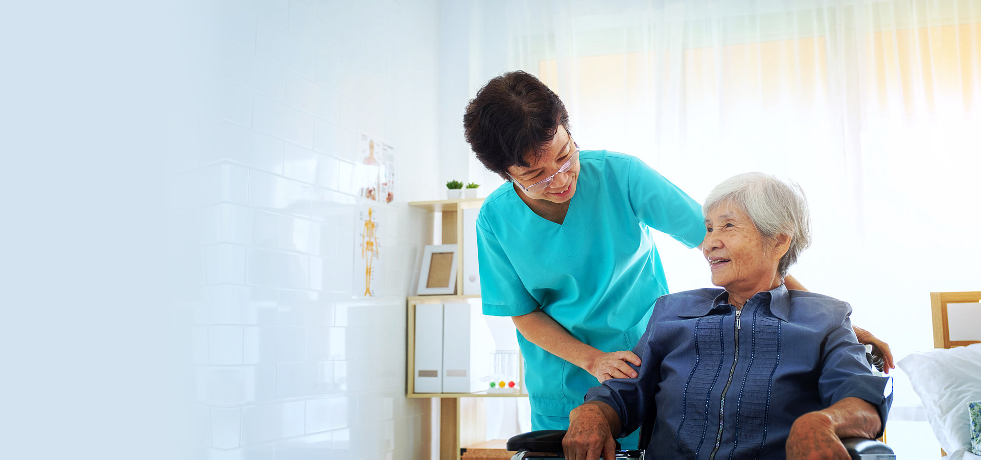 caregiver and senior woman smiling